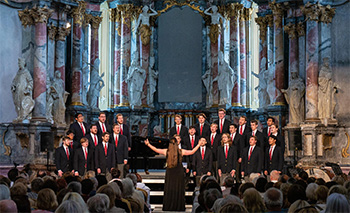 The Wabash College Glee Club performs during its 2023 tour of the Baltics at St. Catherine's Church in Vilnius, Lithuania. Kammer is in the top row, third from left.  (Photo by Andrew Day)